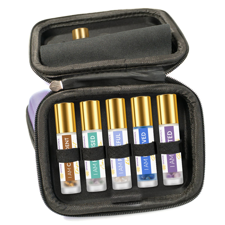 Emotional essential oil elixir roller collection arranged in its protective travel case.