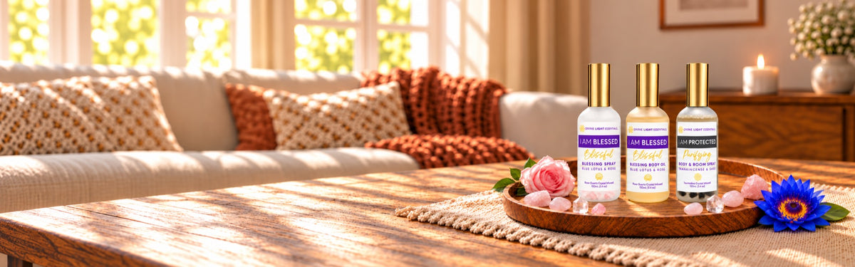 Three bottles of hair care products with gold caps and purple labels are arranged on a wooden tray on a table in a warm, sunlit living room setting.
