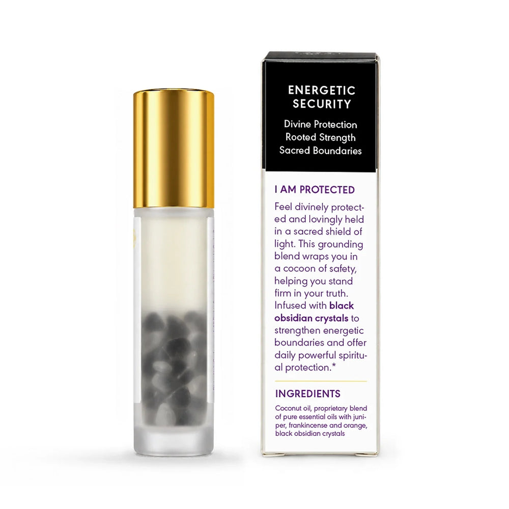 I Am Protected frosted glass essential oil roller with gold cap and black obsidian crystals, shown from the back beside its story-panel box.