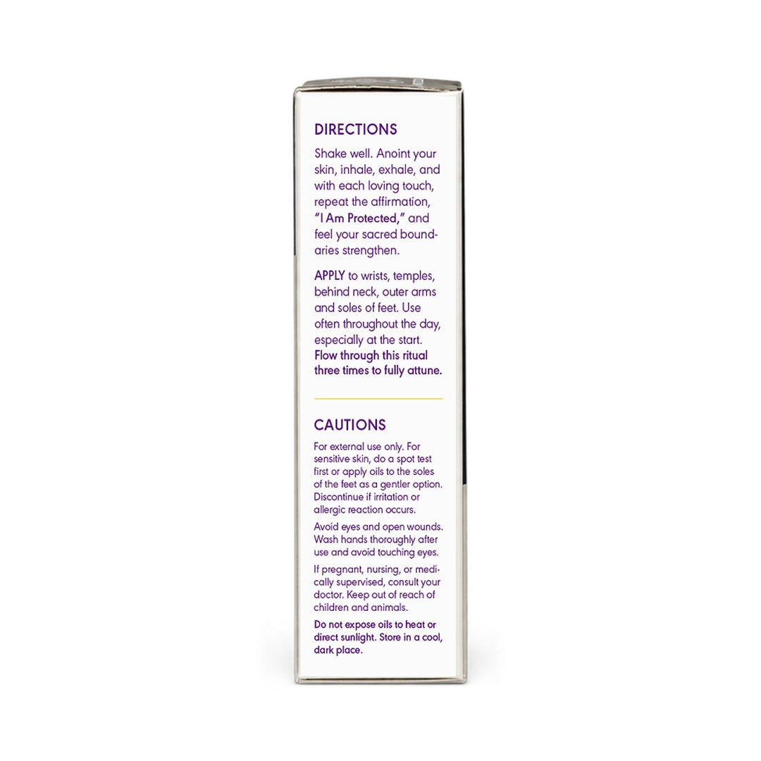 A tall, narrow white box with printed purple text showing directions and cautions, photographed against a plain white background.