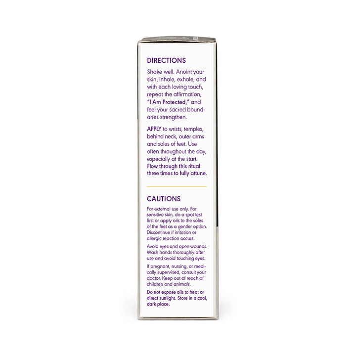 A tall, narrow white box with printed purple text showing directions and cautions, photographed against a plain white background.