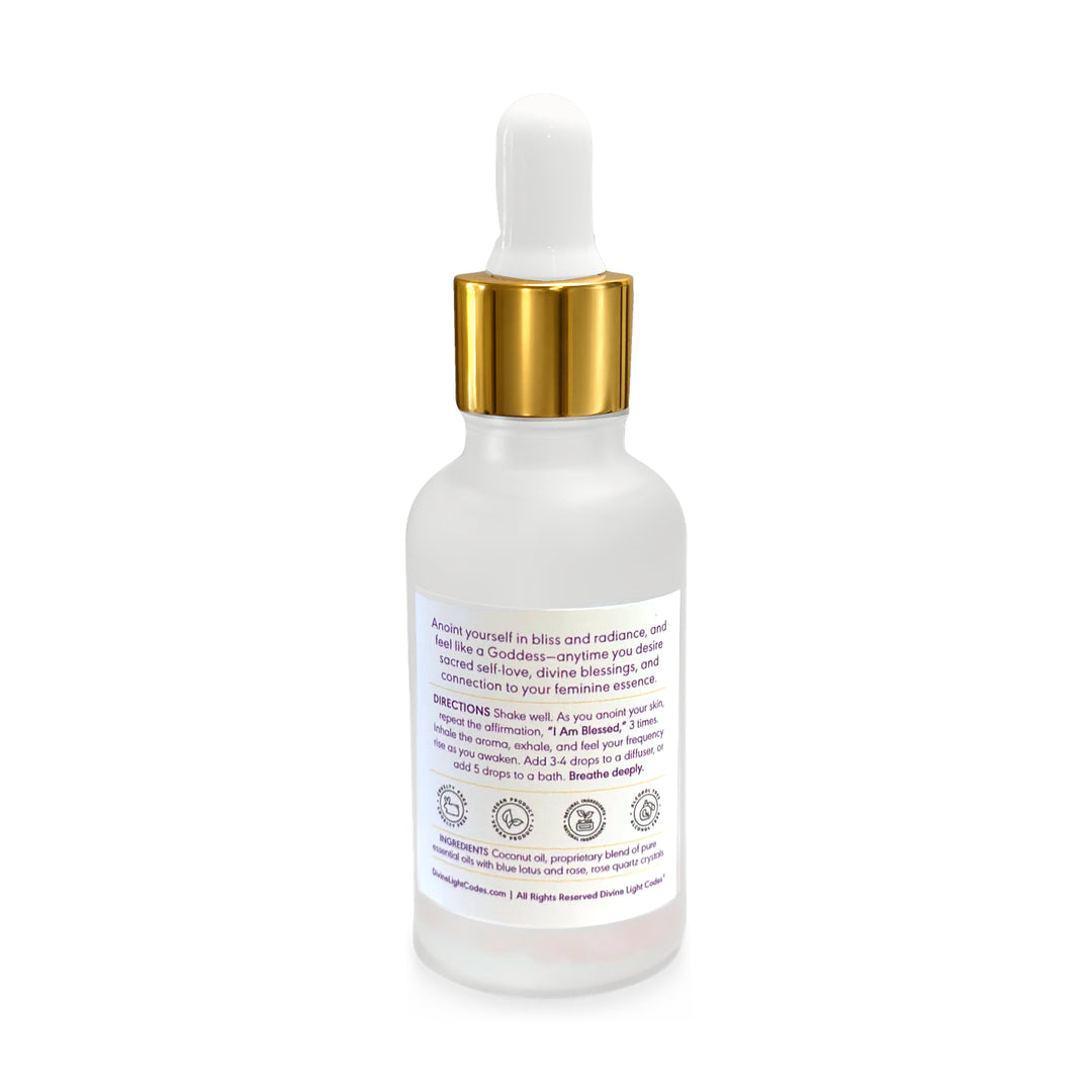 A frosted glass dropper bottle with a metallic gold collar and a white dropper top, shown from the back on a clean white background.