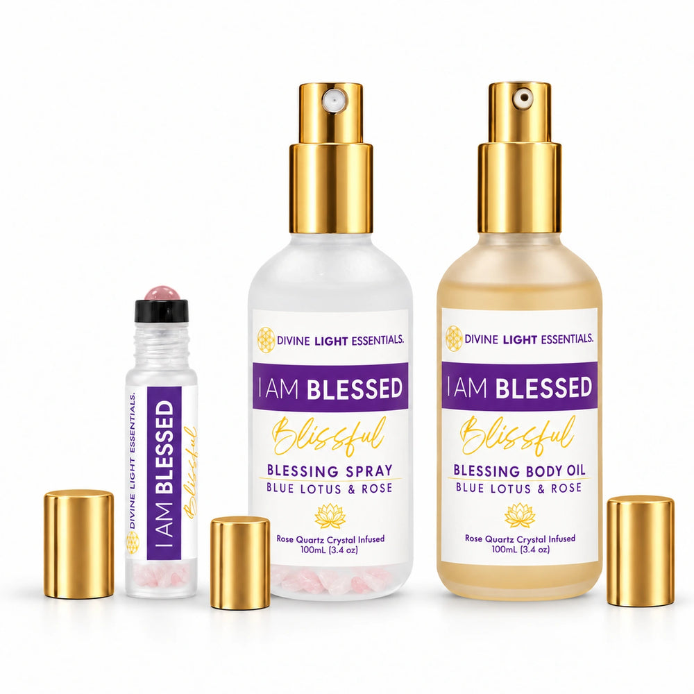 I Am Blessed roller oil, blessing spray, and blessing body oil side by side with all three caps off.