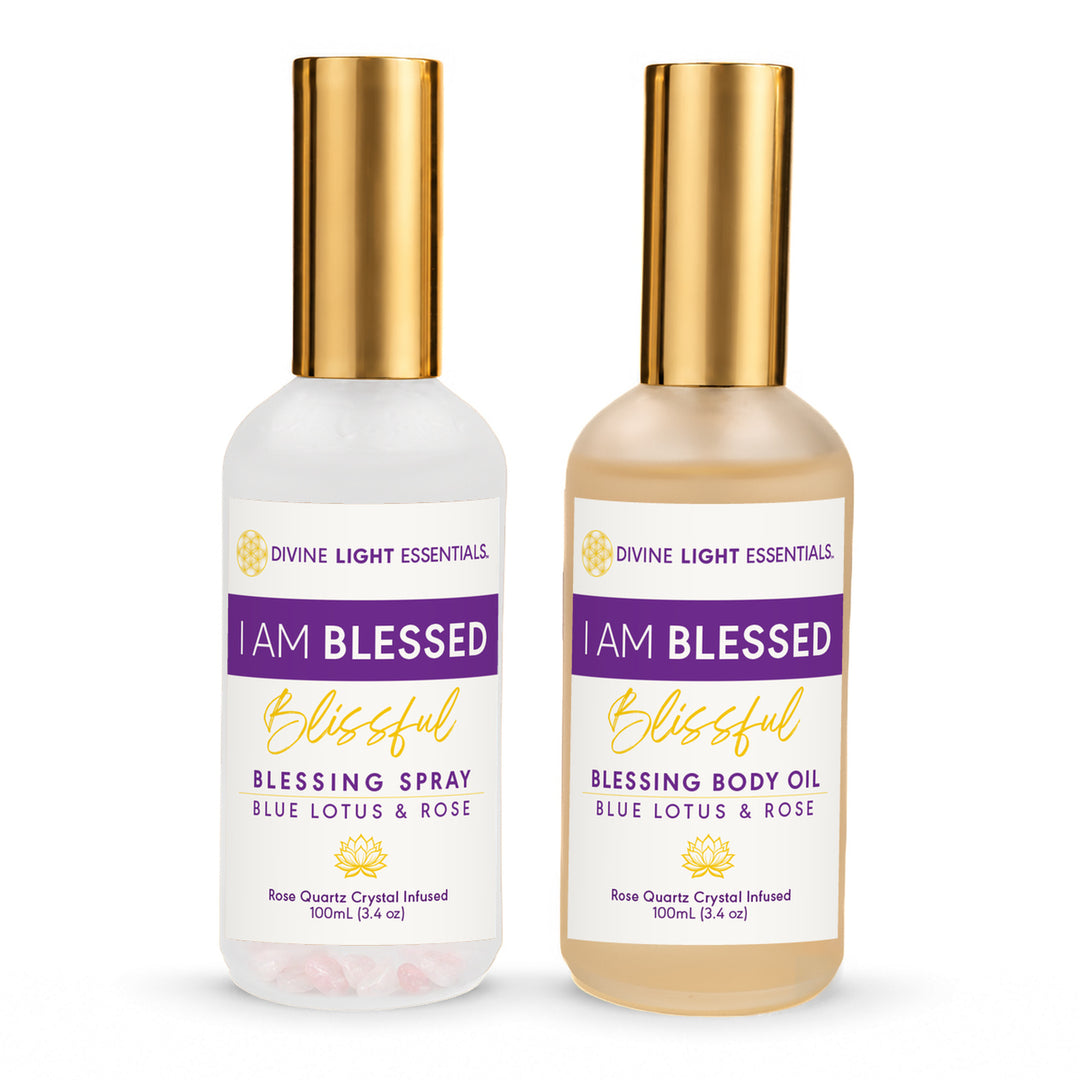 I Am Blessed Blessing Spray and Blessing Body Oil with current purple-and-gold labels and gold caps on white.