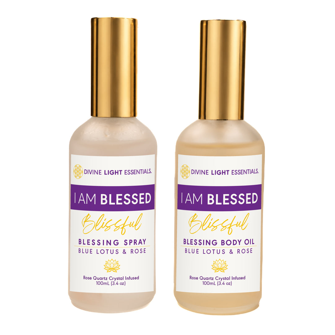 I Am Blessed Blessing Spray and Blessing Body Oil with current purple-and-gold labels and gold caps on white.