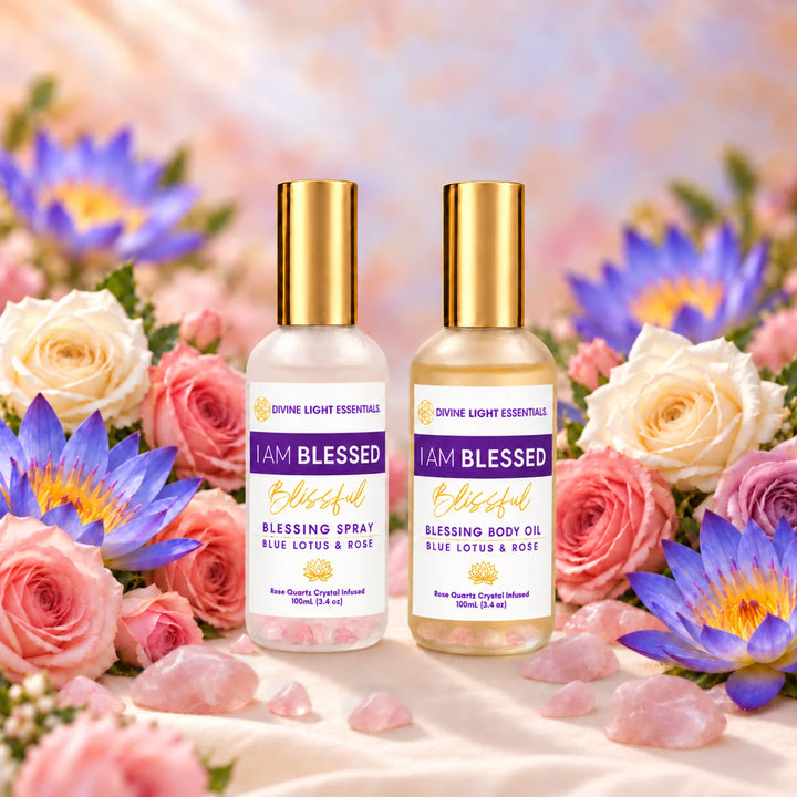 I Am Blessed Blessing Spray and Blessing Body Oil with rose quartz crystals, roses, and blue lotus flowers.