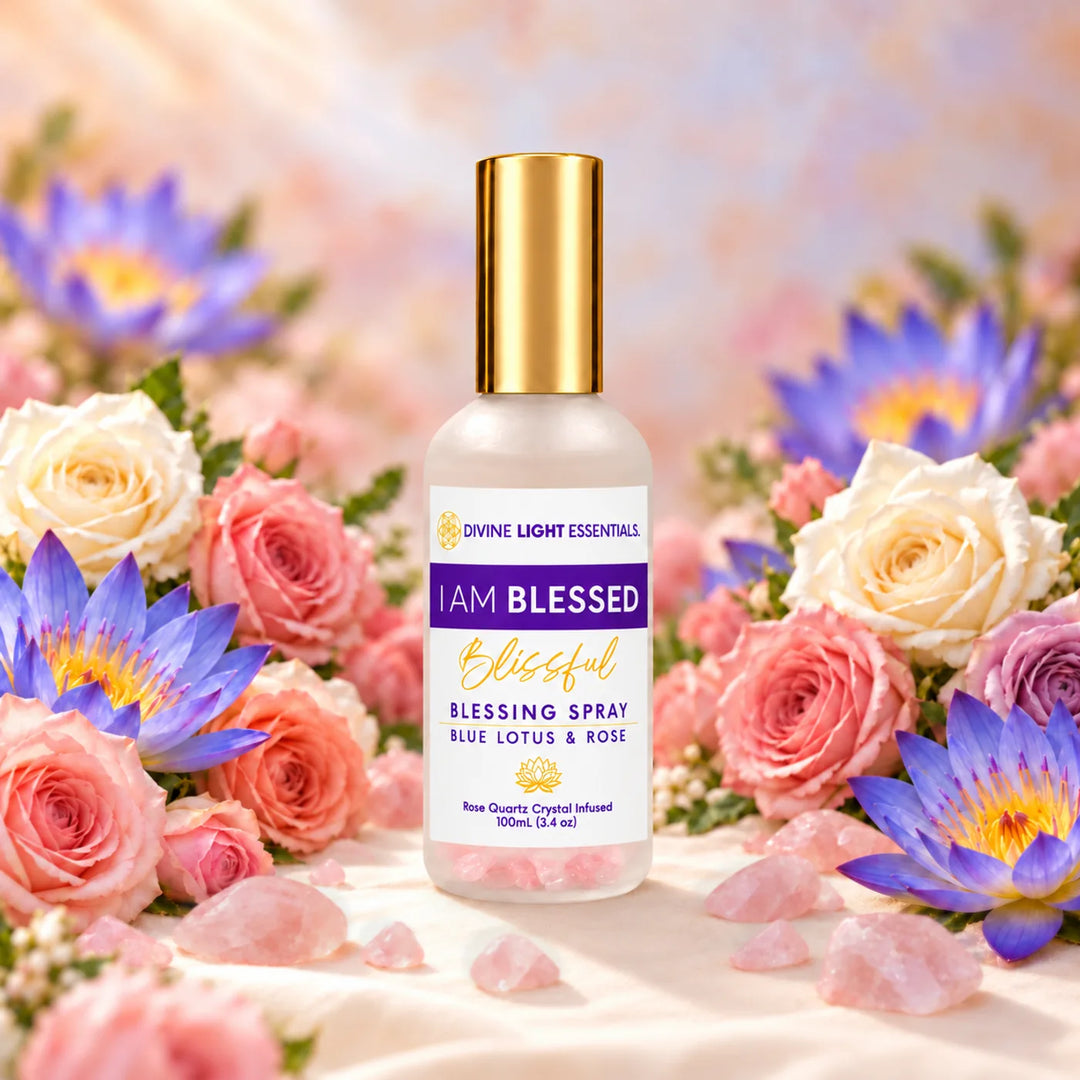 I Am Blessed Blessing Spray surrounded by roses, blue lotus flowers, and rose quartz crystals.