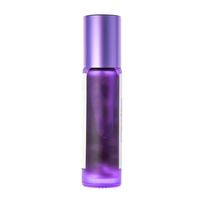 A purple glass roll-on bottle with a matching metallic purple cap, shown against a plain white background.
