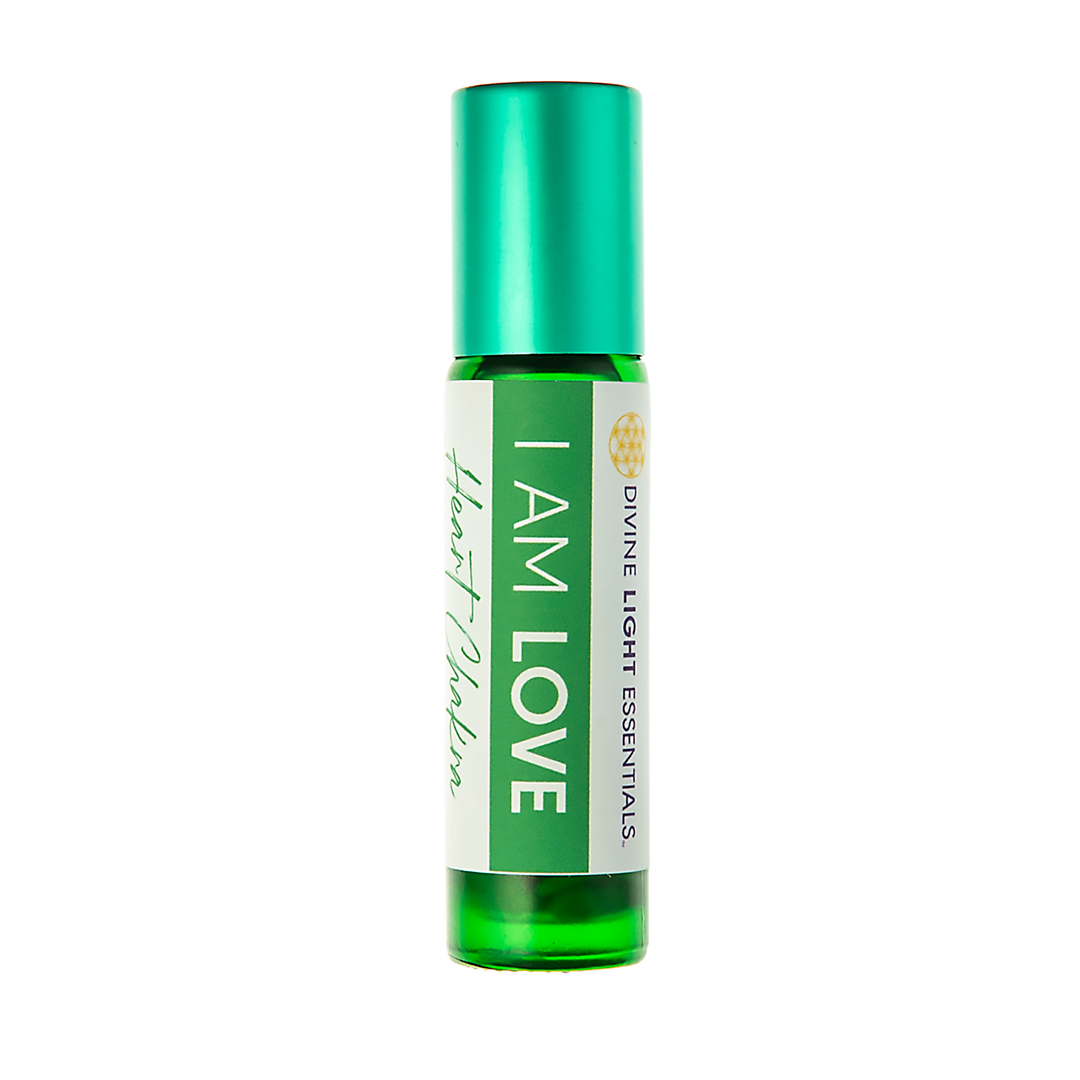 A green glass roll-on bottle with a metallic green cap and a white label reading 'I AM LOVE' and 'DIVINE LIGHT ESSENTIALS', on a plain white background.