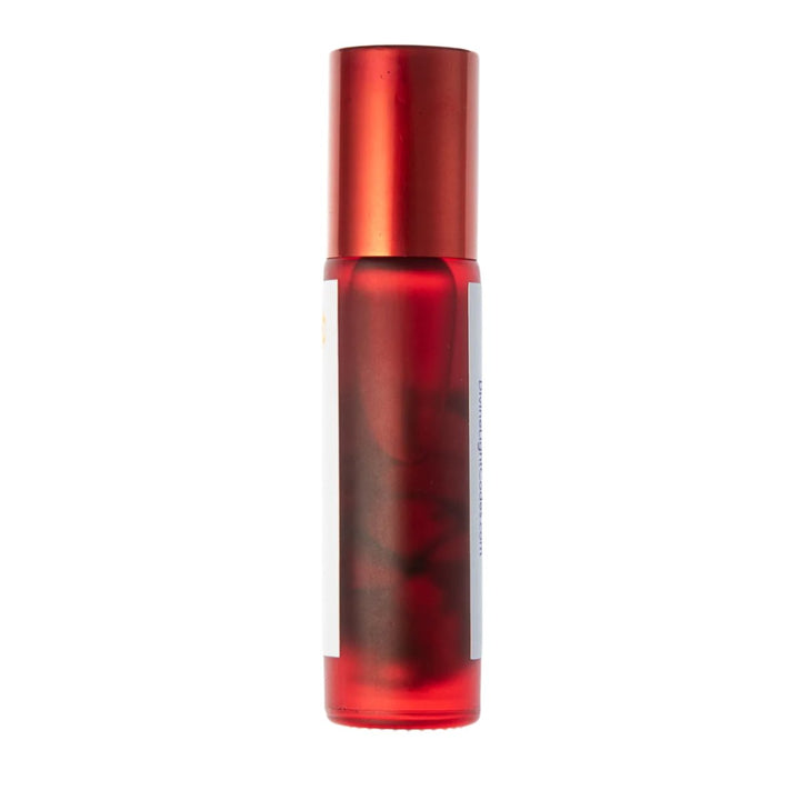 Red rollerball bottle with healing energy essence for spiritual awakening and ascension support