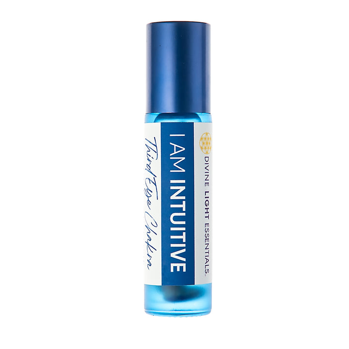 A Divine Light Essentials roll-on bottle with a metallic blue cap and a white label featuring blue and gold text, set against a plain white background.