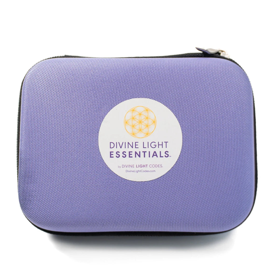 Purple travel case with Divine Light Essentials label and gold geometric symbol on front