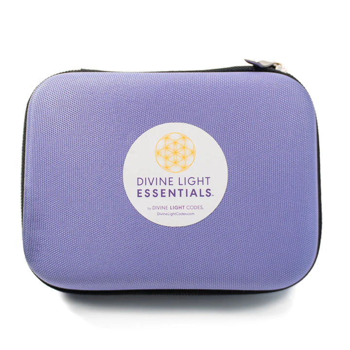 Purple travel case with Divine Light Essentials label and gold geometric symbol on front
