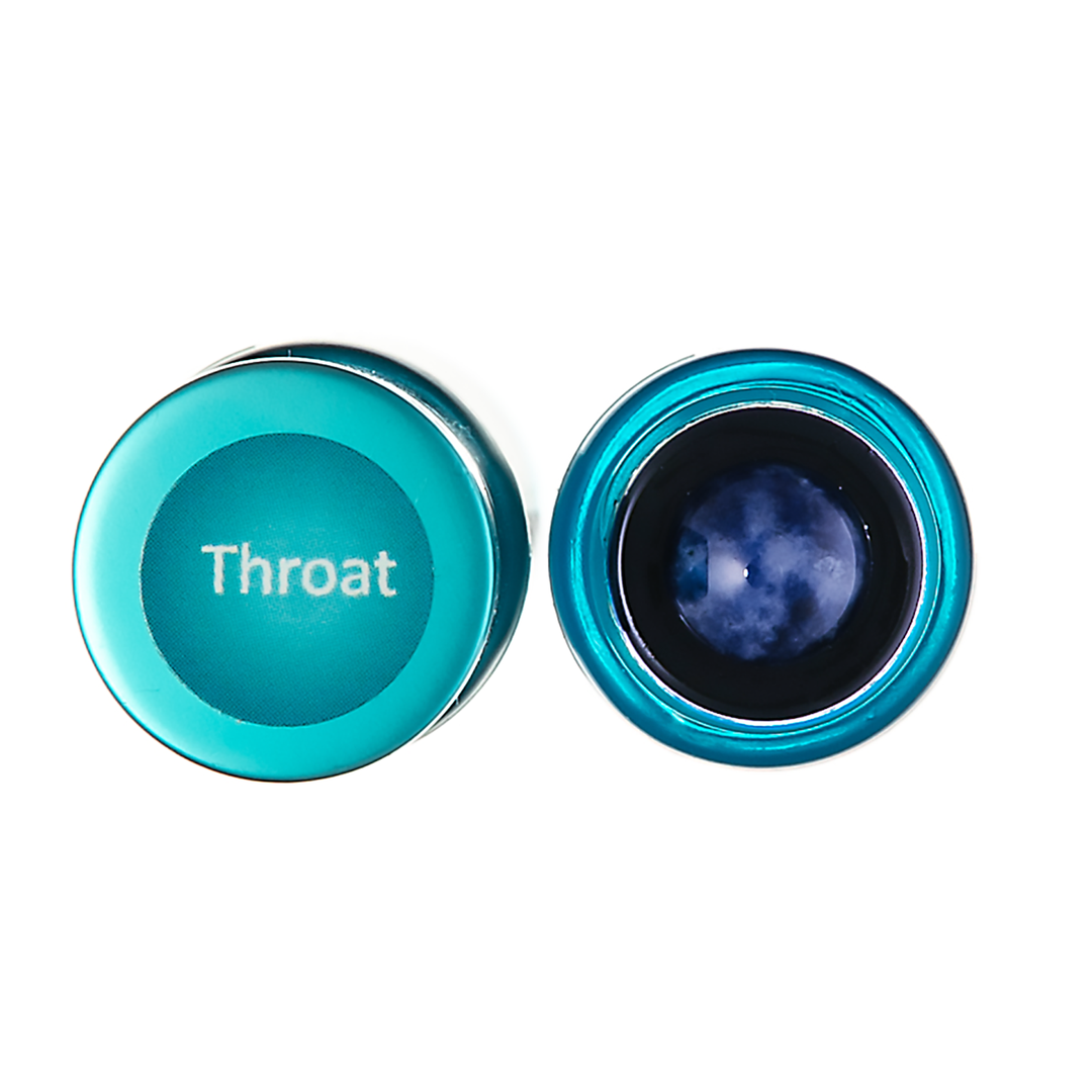 Two round metallic teal containers on a white background, one closed with the word &