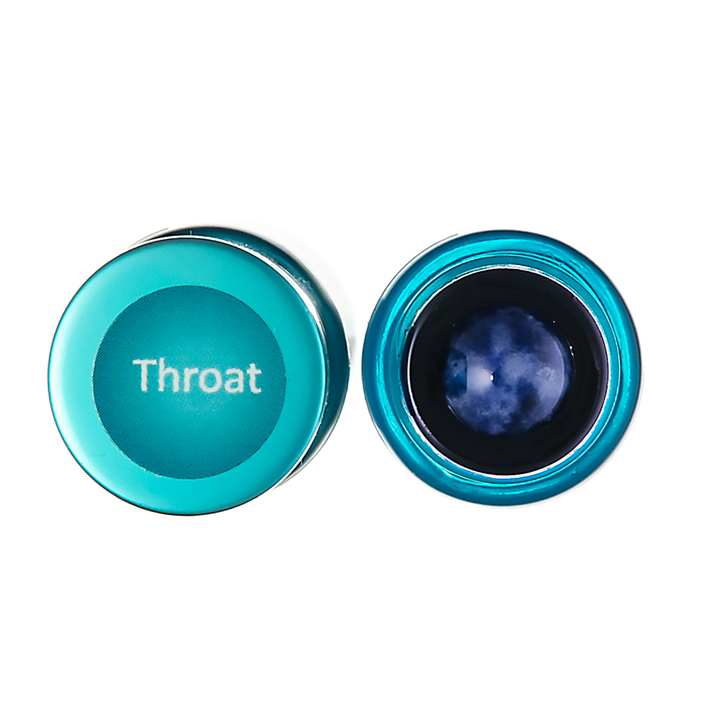 Two round metallic teal containers on a white background, one closed with the word &